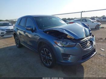  Salvage Mazda Cx