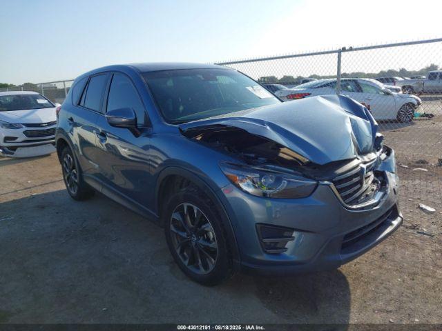  Salvage Mazda Cx