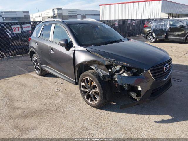  Salvage Mazda Cx